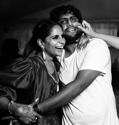 Upasana Kamineni with her brother