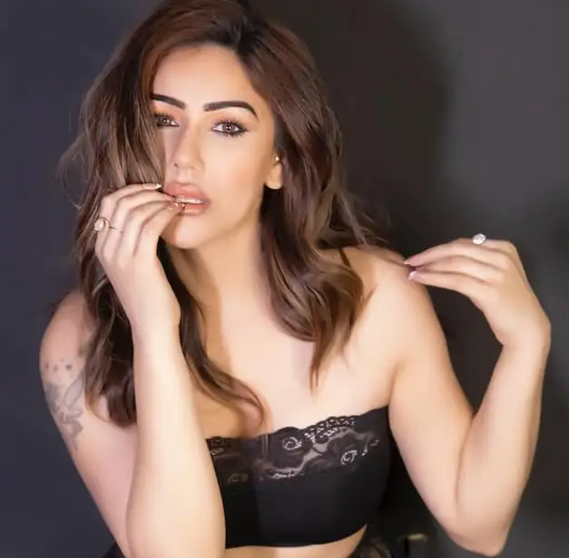 Kangana Sharma on the right arm tattos