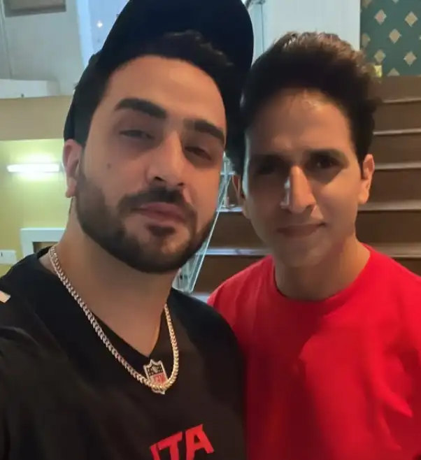 Aly Goni with her brother
