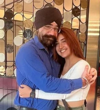Ashnoor Kaur with her father