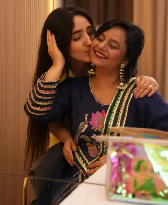 Ashnoor Kaur with her mother